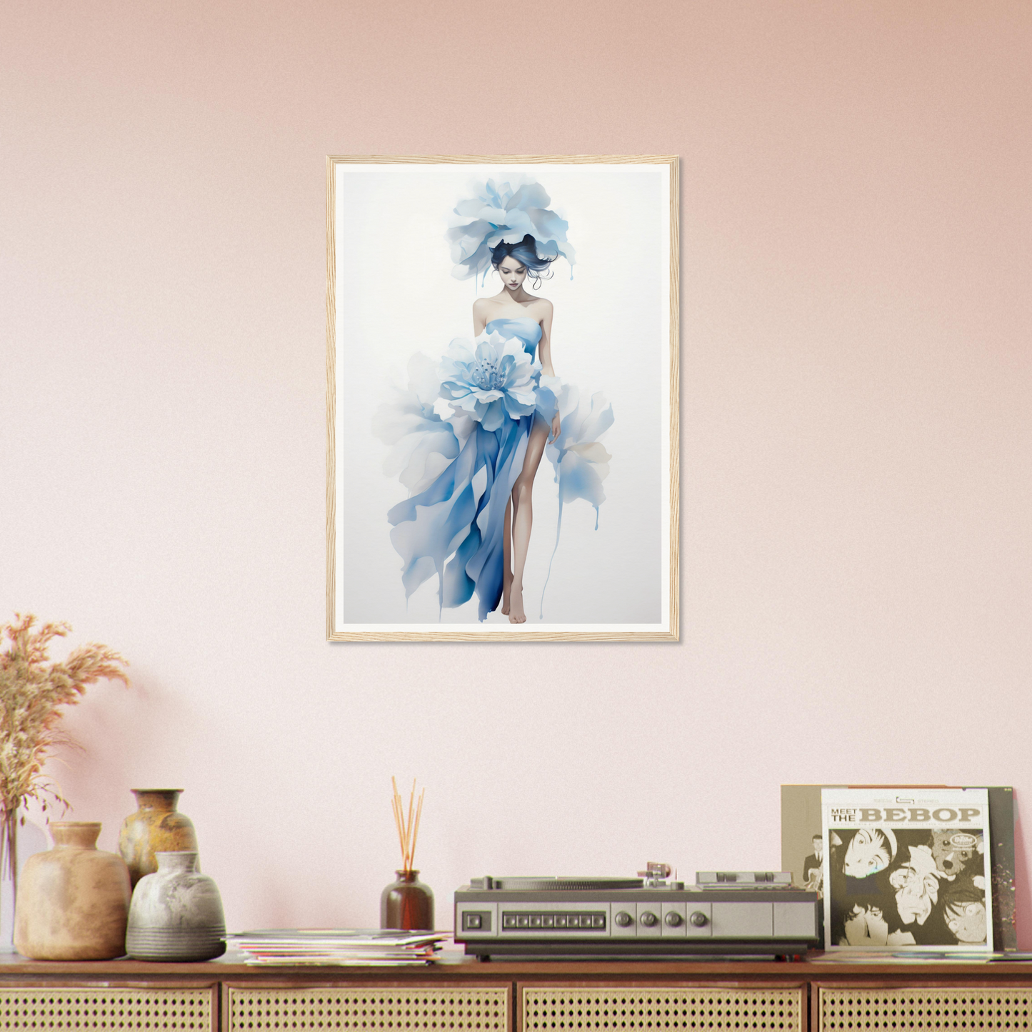 A framed print of a woman in a blue dress