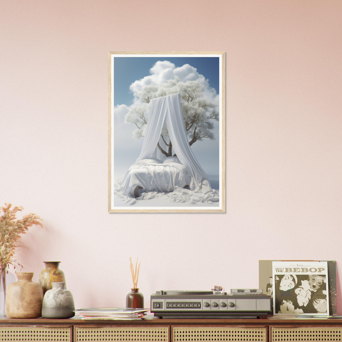 A framed print of a woman in a white dress sitting on a bed with a tree in the background