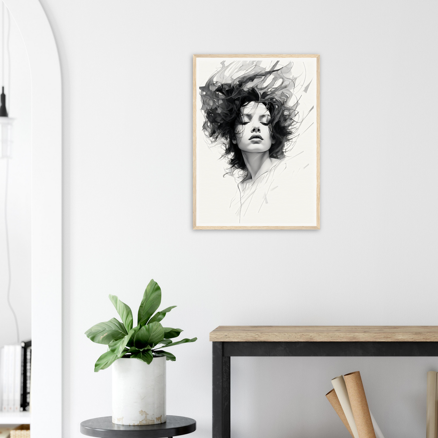 A framed print of a woman’s face with black hair