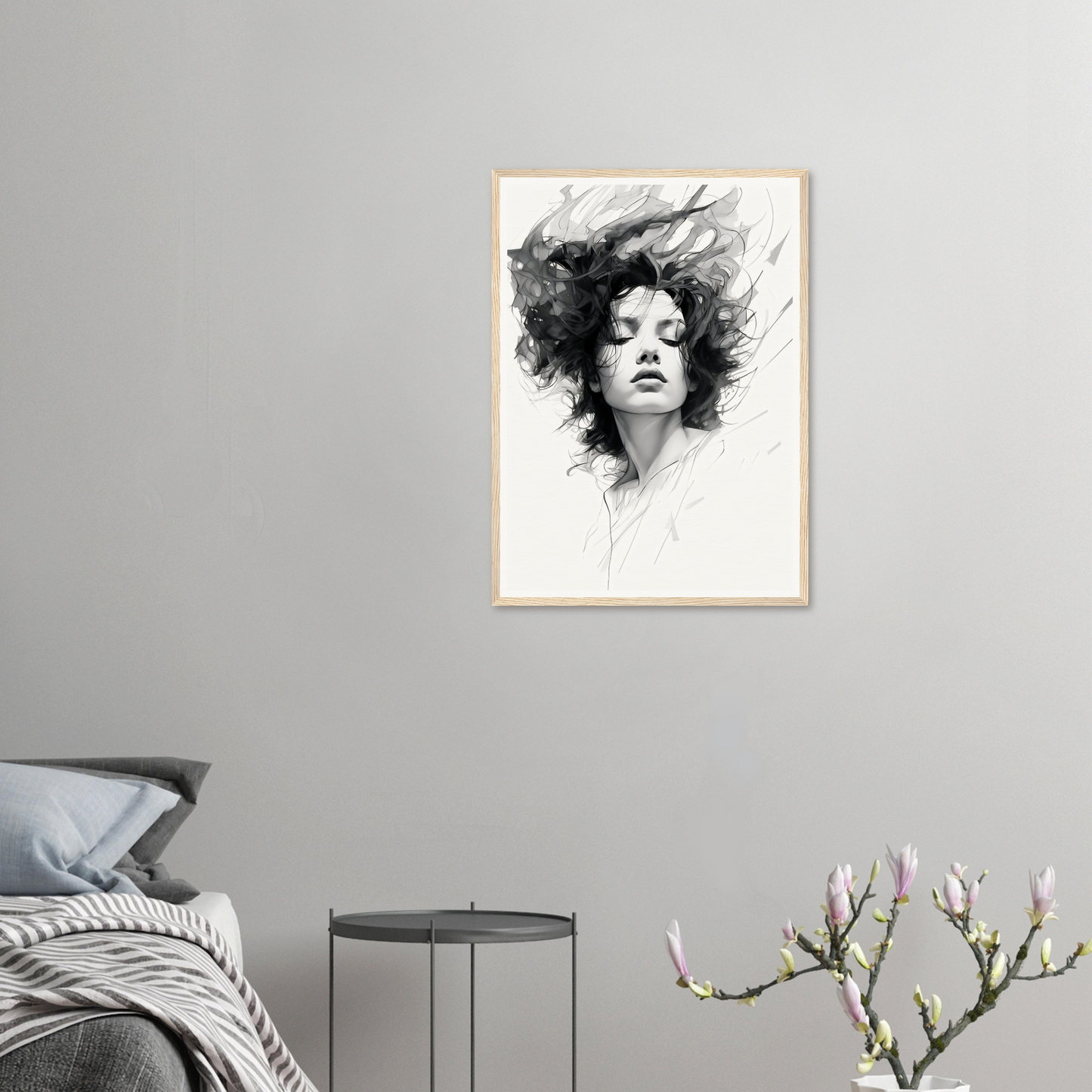 A framed print of a woman’s face with black hair