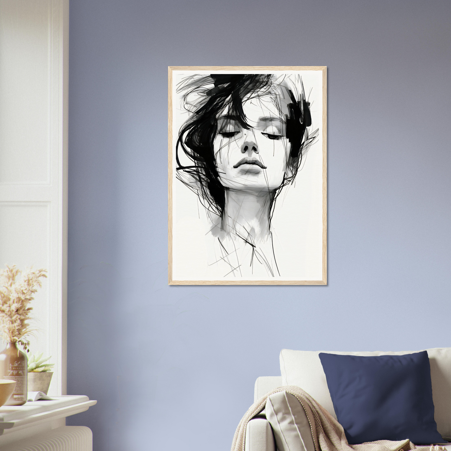 A framed print of a woman’s face