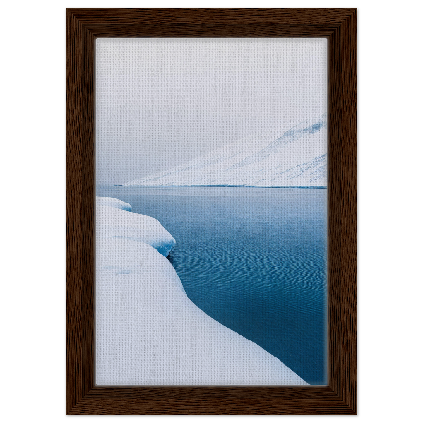 Framed photograph of a snowy landscape and blue water for Frozen Serenity Echoes room decor