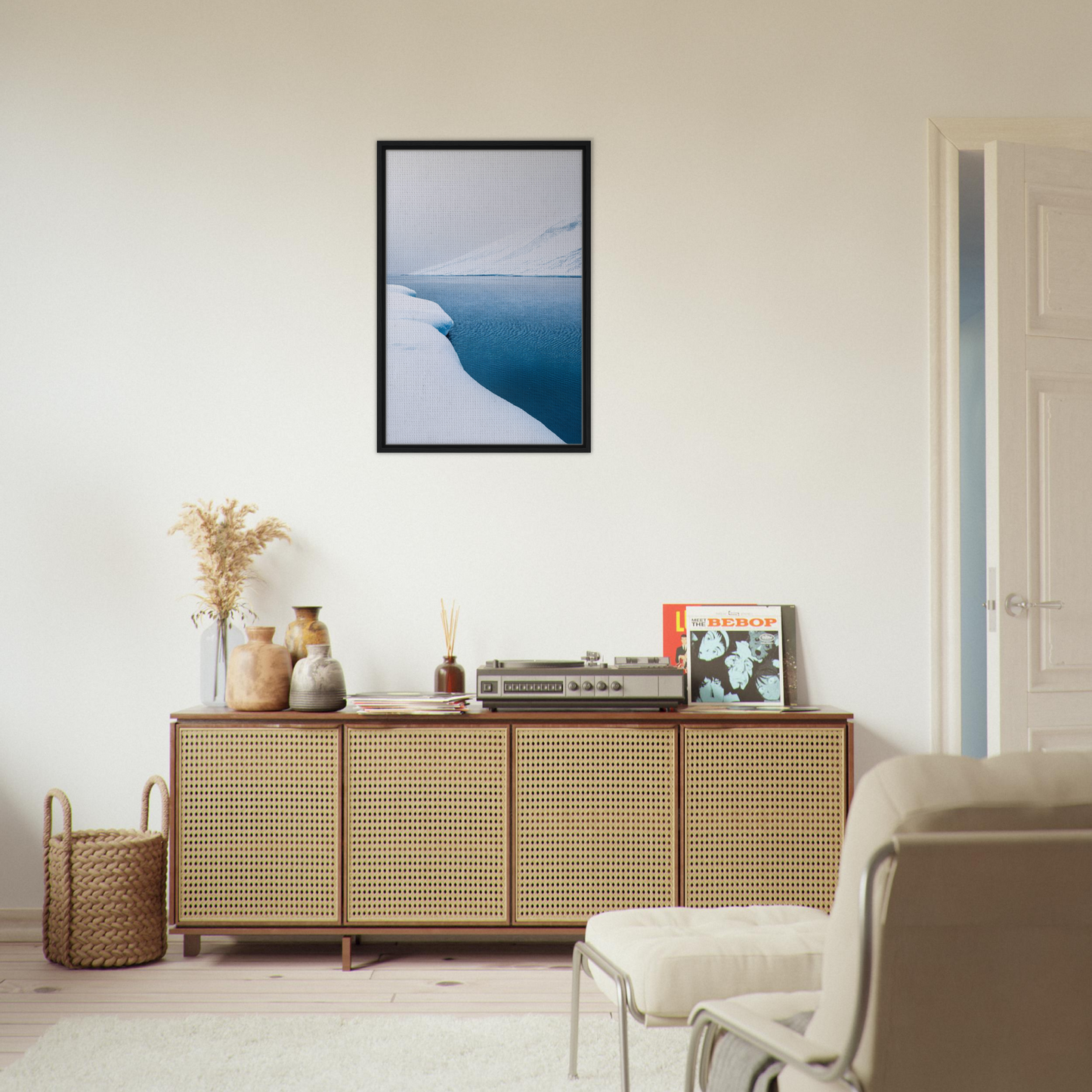 Wooden sideboard from Frozen Serenity Echoes with cane-webbed doors and decorative items