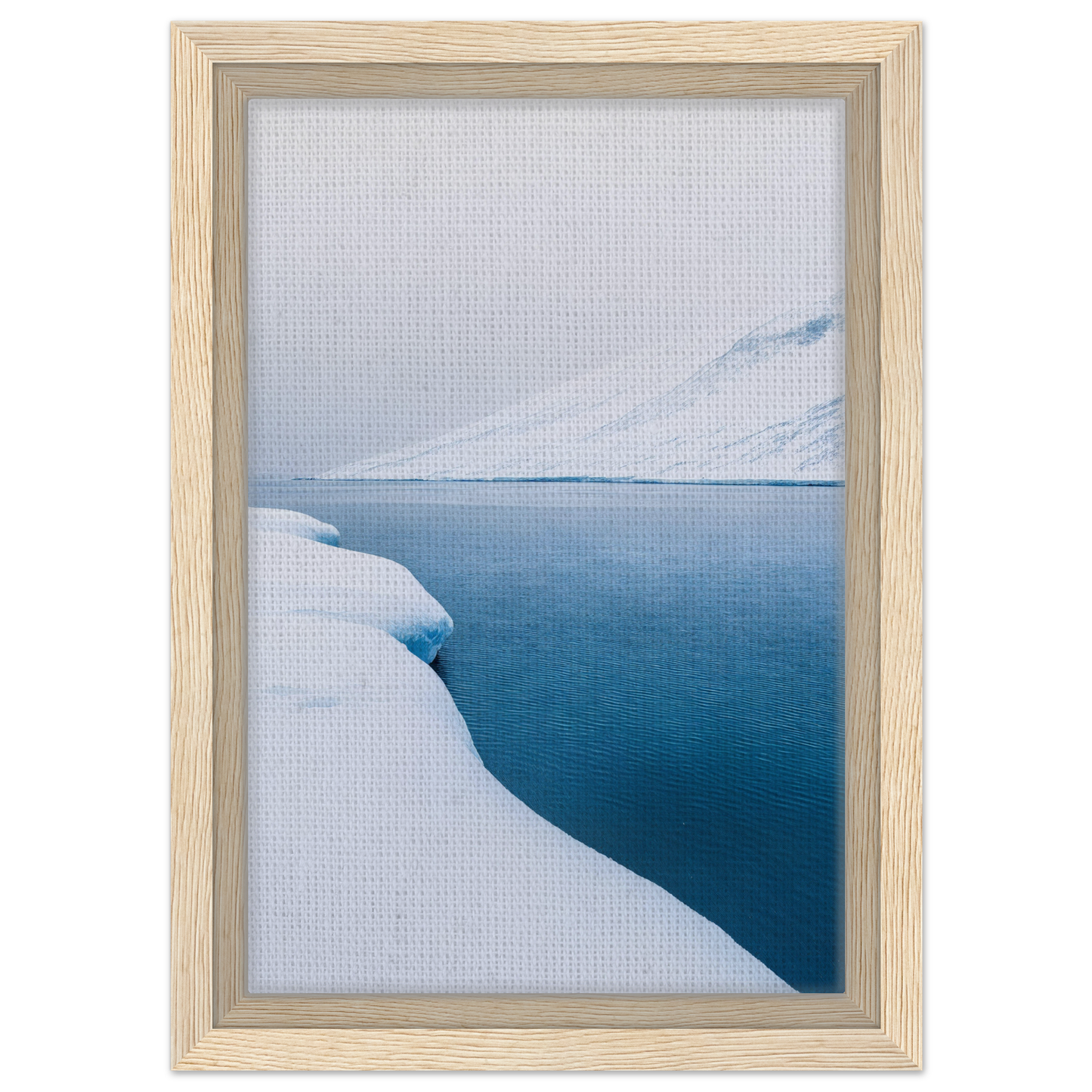 Framed photograph of a snowy landscape with blue water for Frozen Serenity Echoes decor