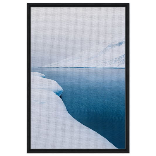 Framed canvas print of Frozen Serenity Echoes featuring a snowy landscape and deep blue water