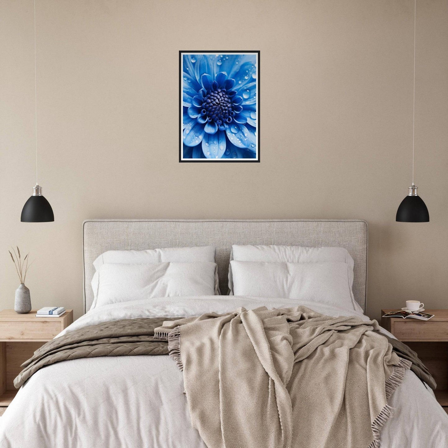 Bed with white linens, beige throw blanket, and a blue floral artwork above the headboard.