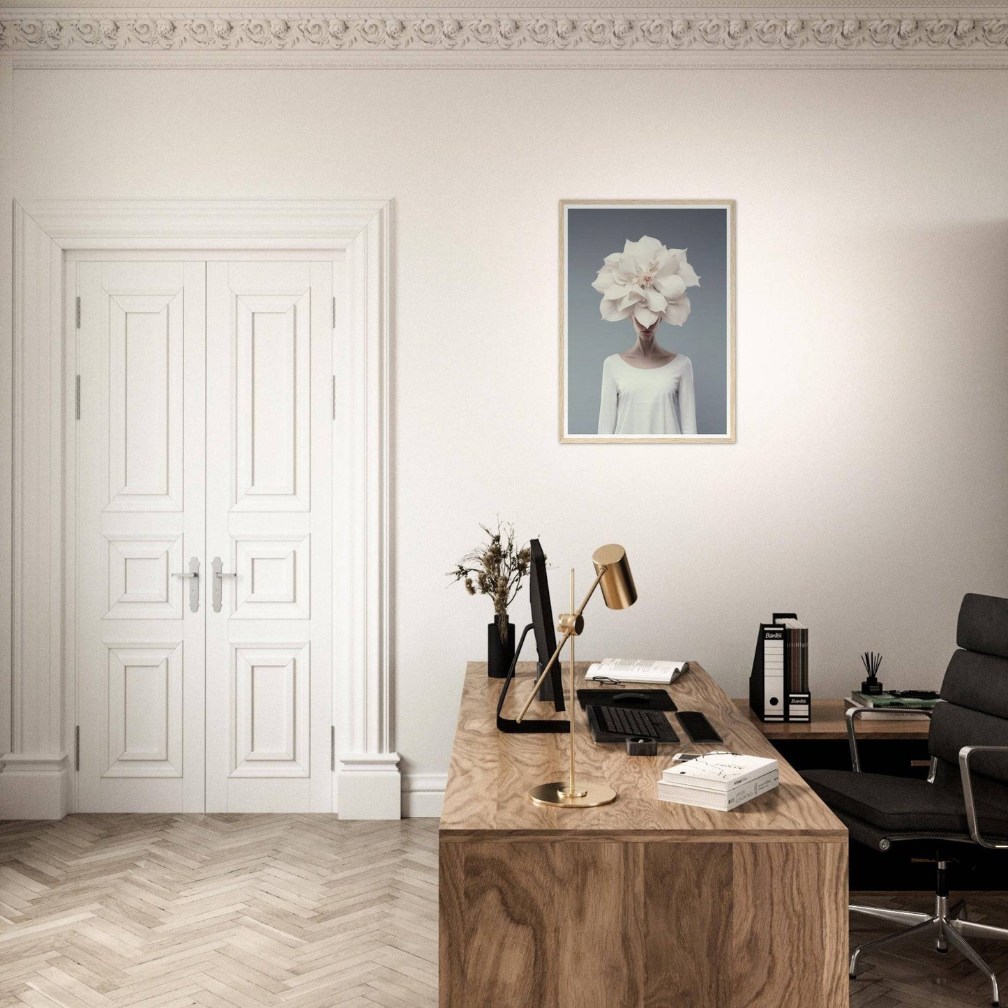 Wooden desk with office supplies and a typewriter in a minimalist workspace.