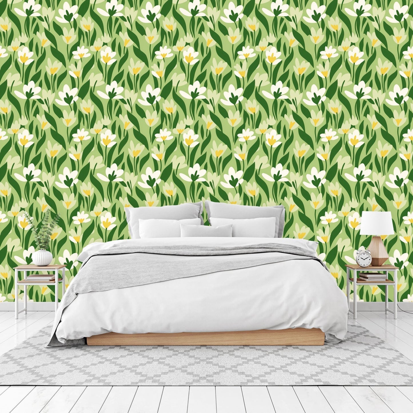 White bed with crisp linens against a floral wallpaper backdrop.