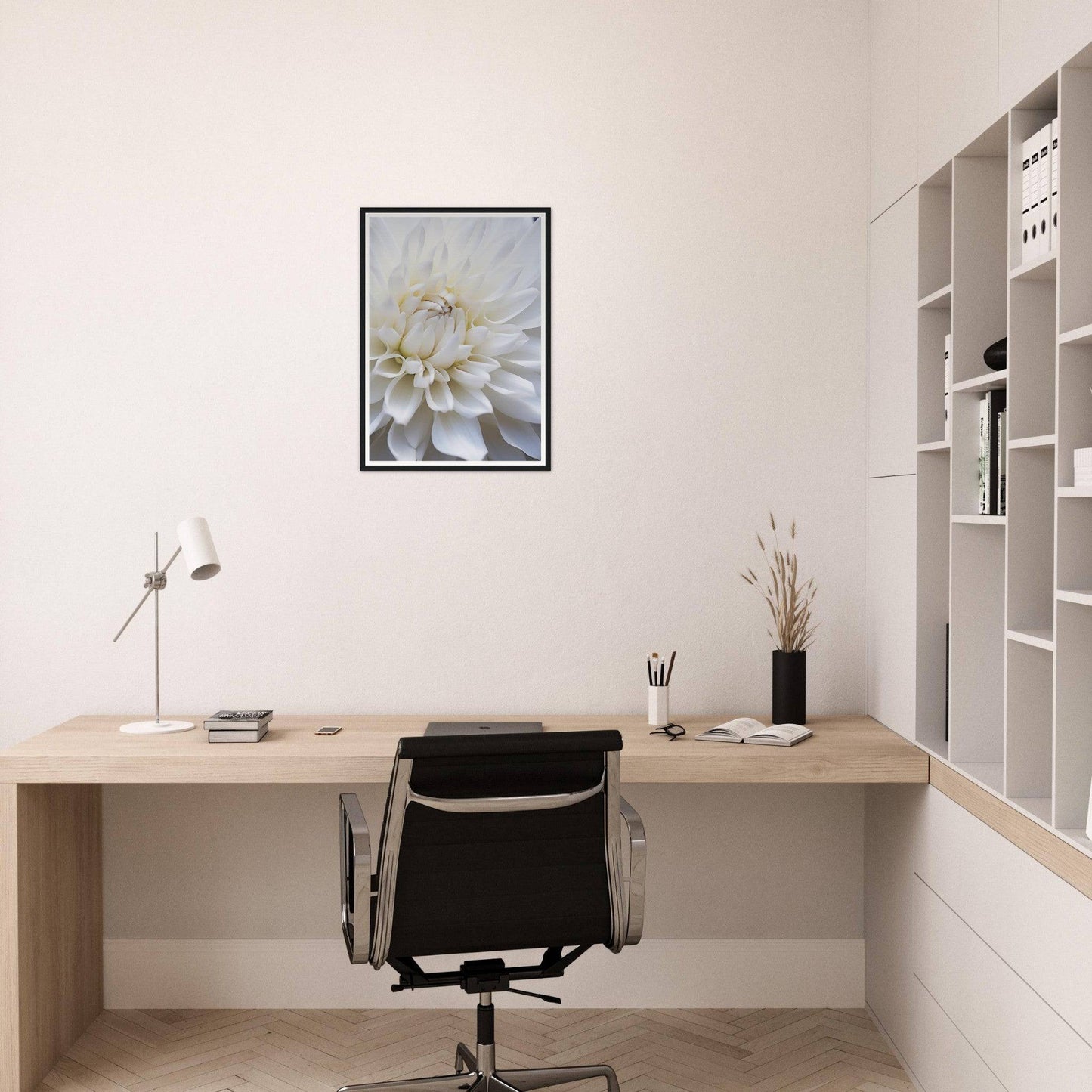 Minimalist home office workspace with a wooden desk and black office chair.