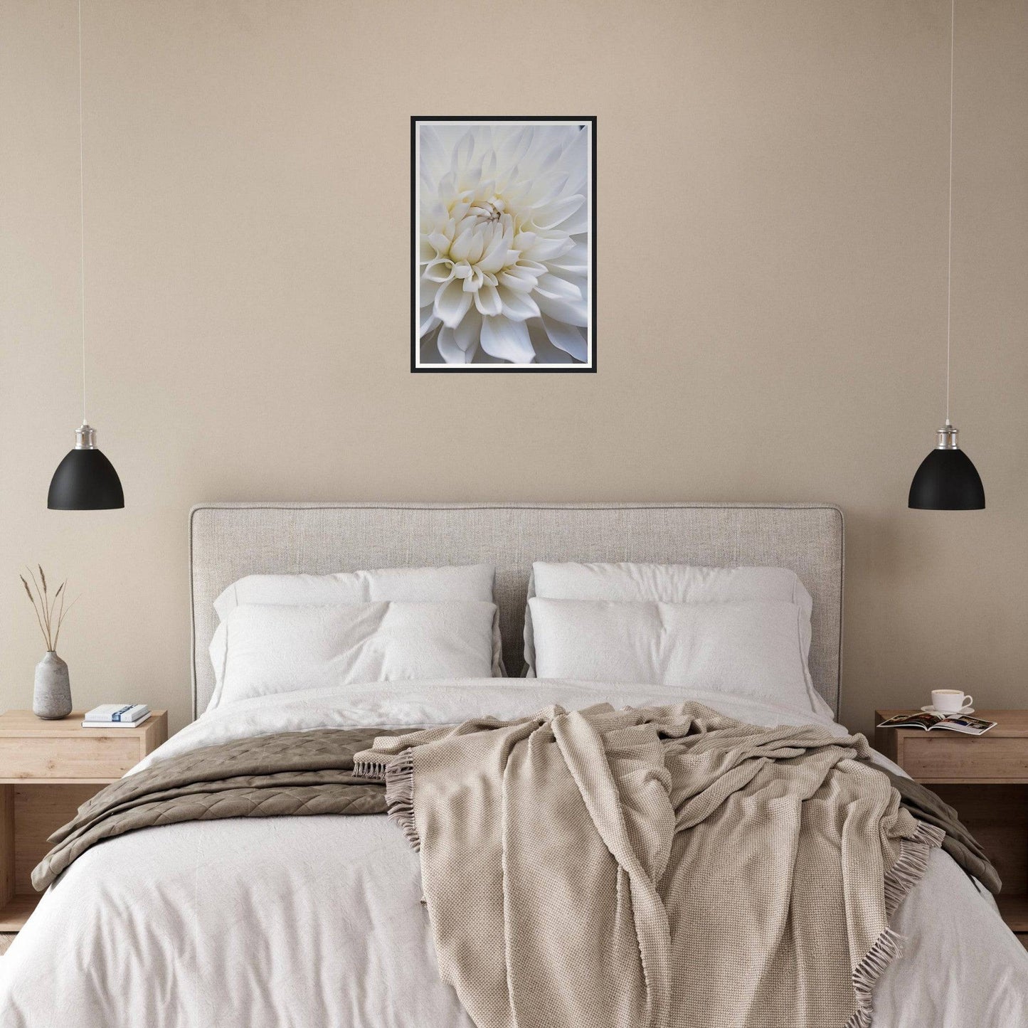 Bed with white pillows and linens, topped with a beige throw blanket.