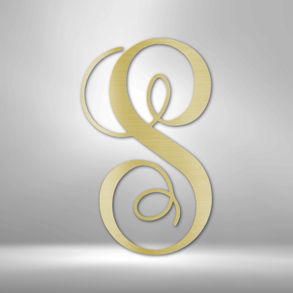 Ornate golden letter ’S’ with curled flourishes.