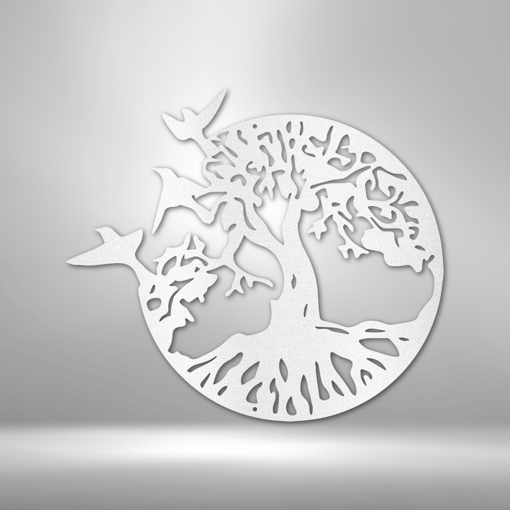 Circular white cutout design featuring a tree with spreading branches and roots.