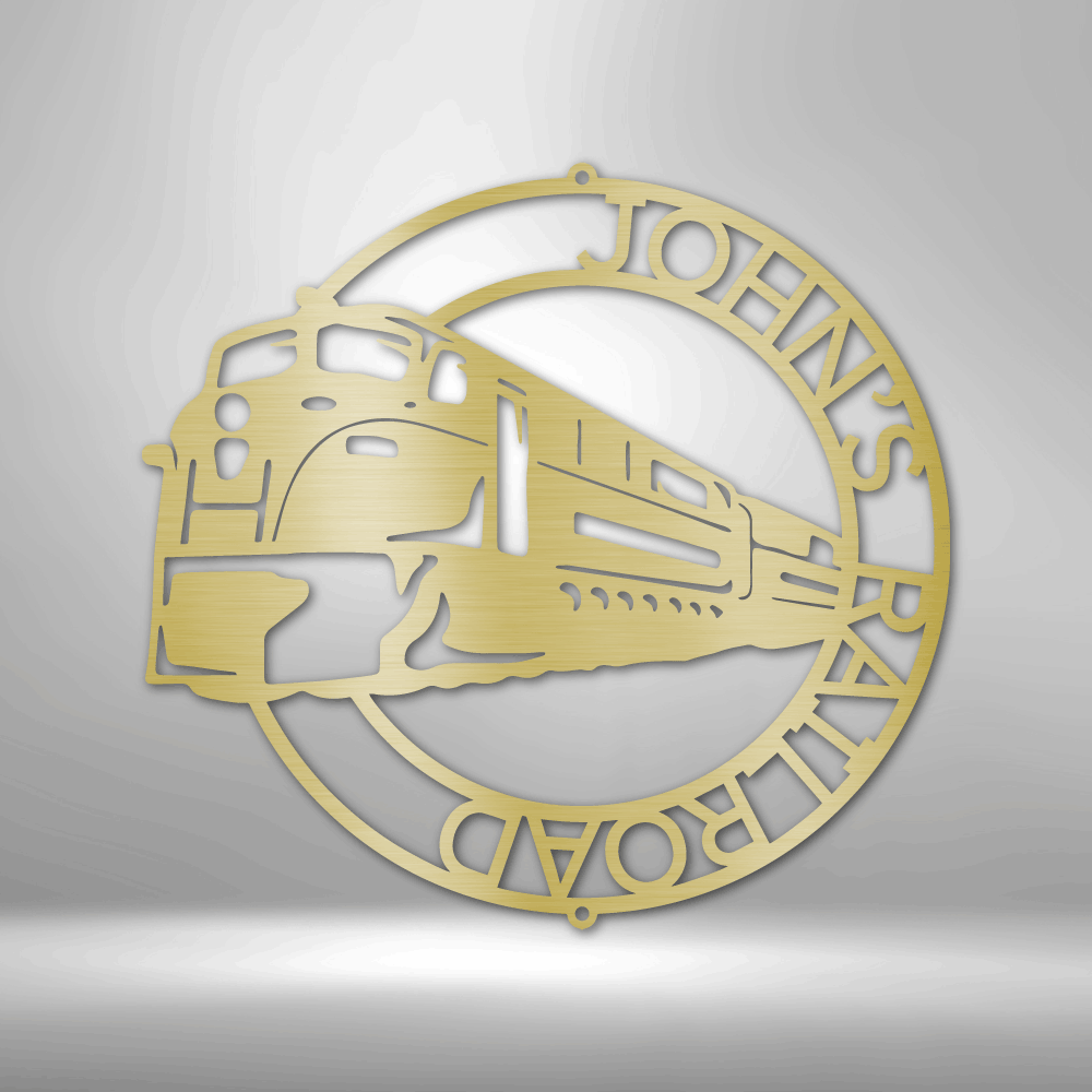 Gold-colored circular logo featuring a stylized train and the text ’JOHN’S RAILROAD’.