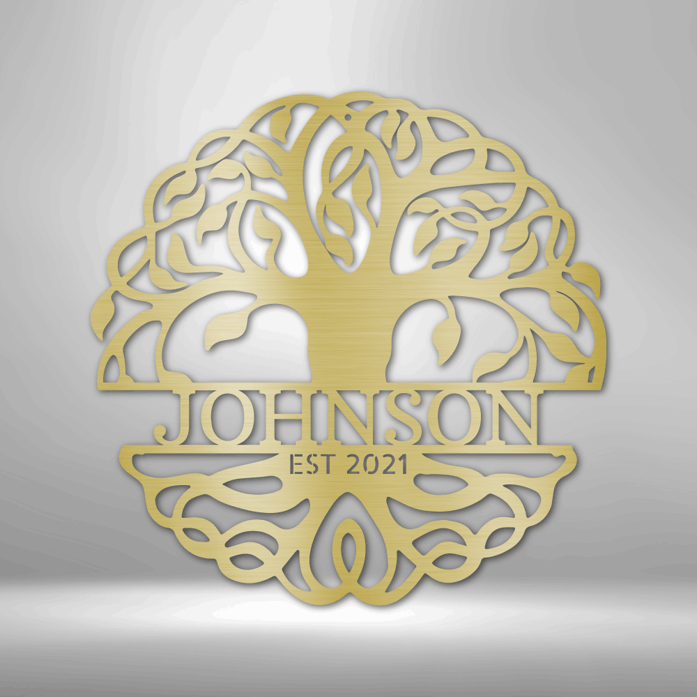 Decorative circular tree-of-life design with ’JOHNSON EST 2021’’ text, appearing to be a metallic gold wall art piece.