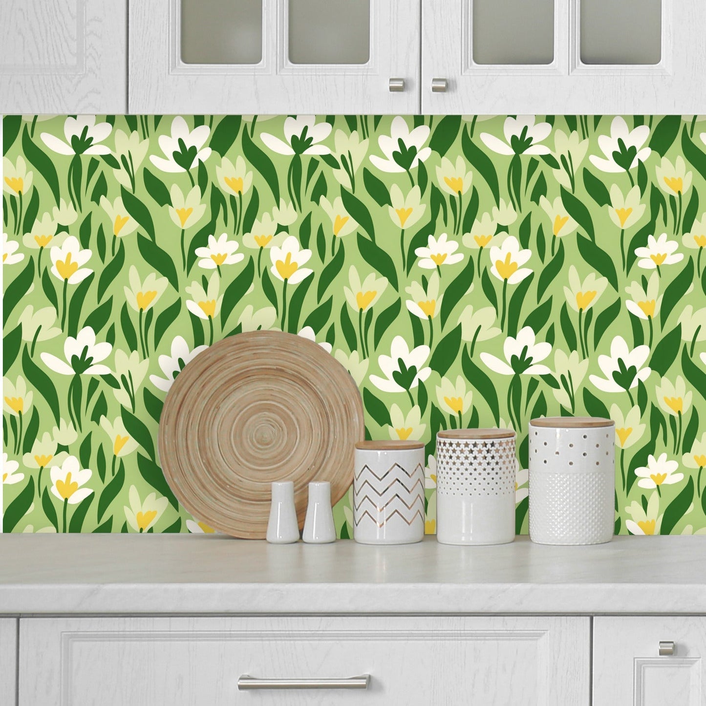 A kitchen wall with a green and yellow floral pattern