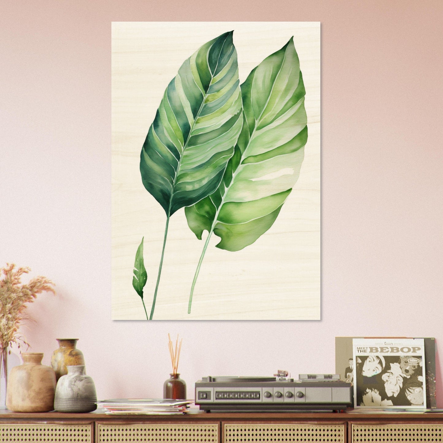 A large green leaf on a beige background
