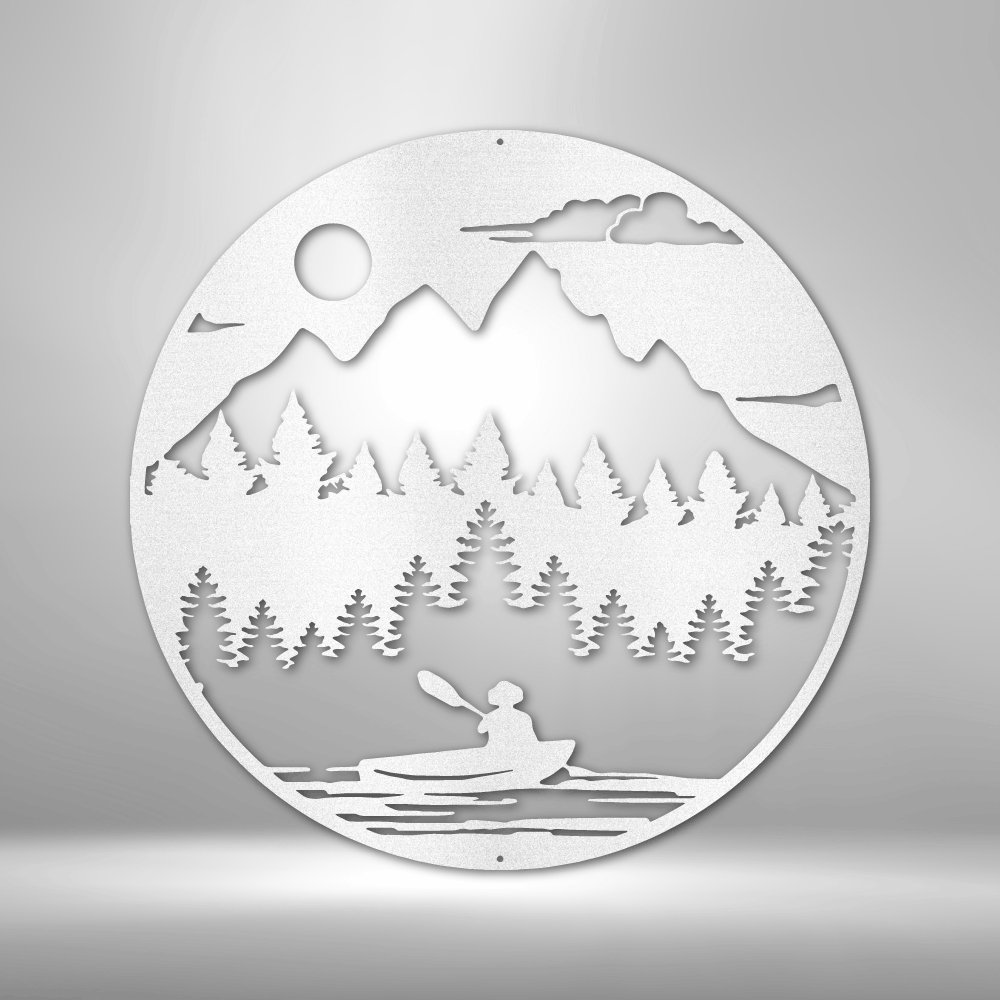 Circular white cutout depicting a mountain landscape with trees and a person in a canoe.