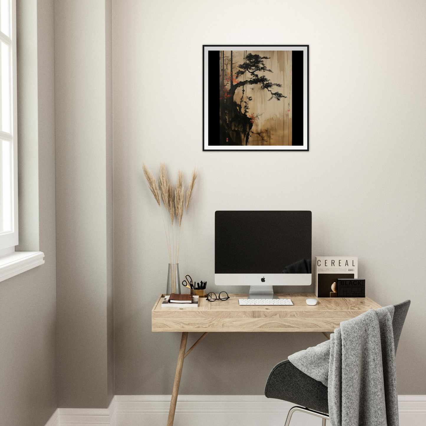 Minimalist wooden desk featuring an iMac and Pine Solitude framed artwork above