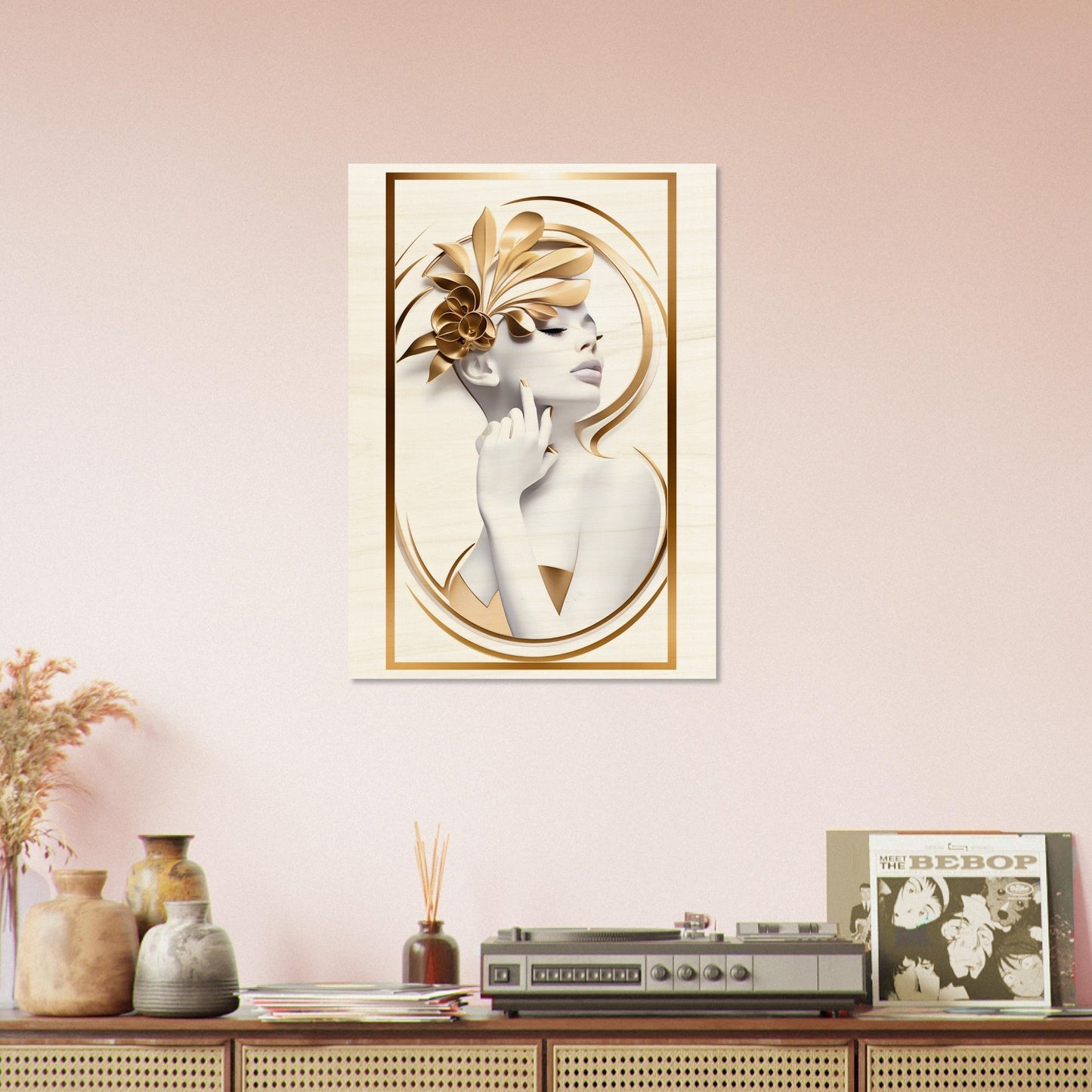 Framed artwork depicting a stylized female figure with golden botanical elements adorning her head.