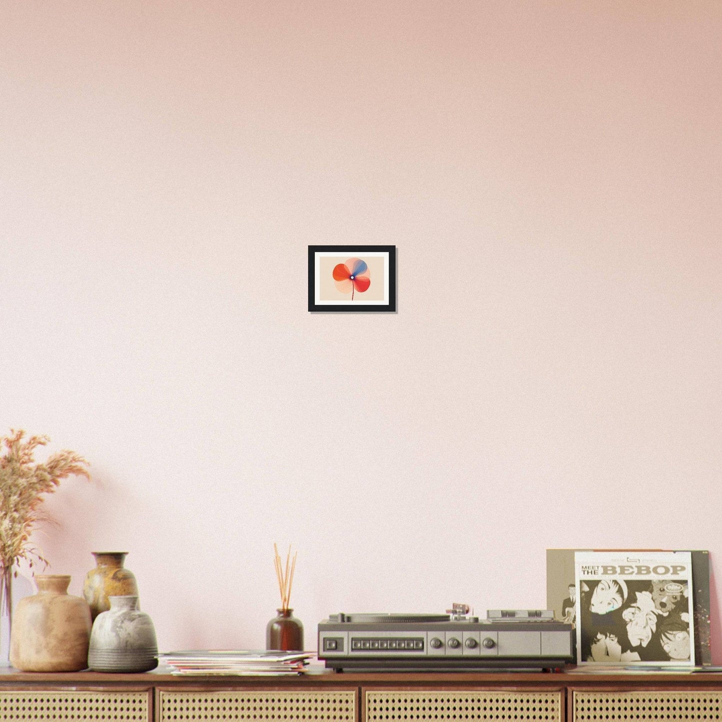 Vintage stereo receiver on a wooden console table with decorative objects.