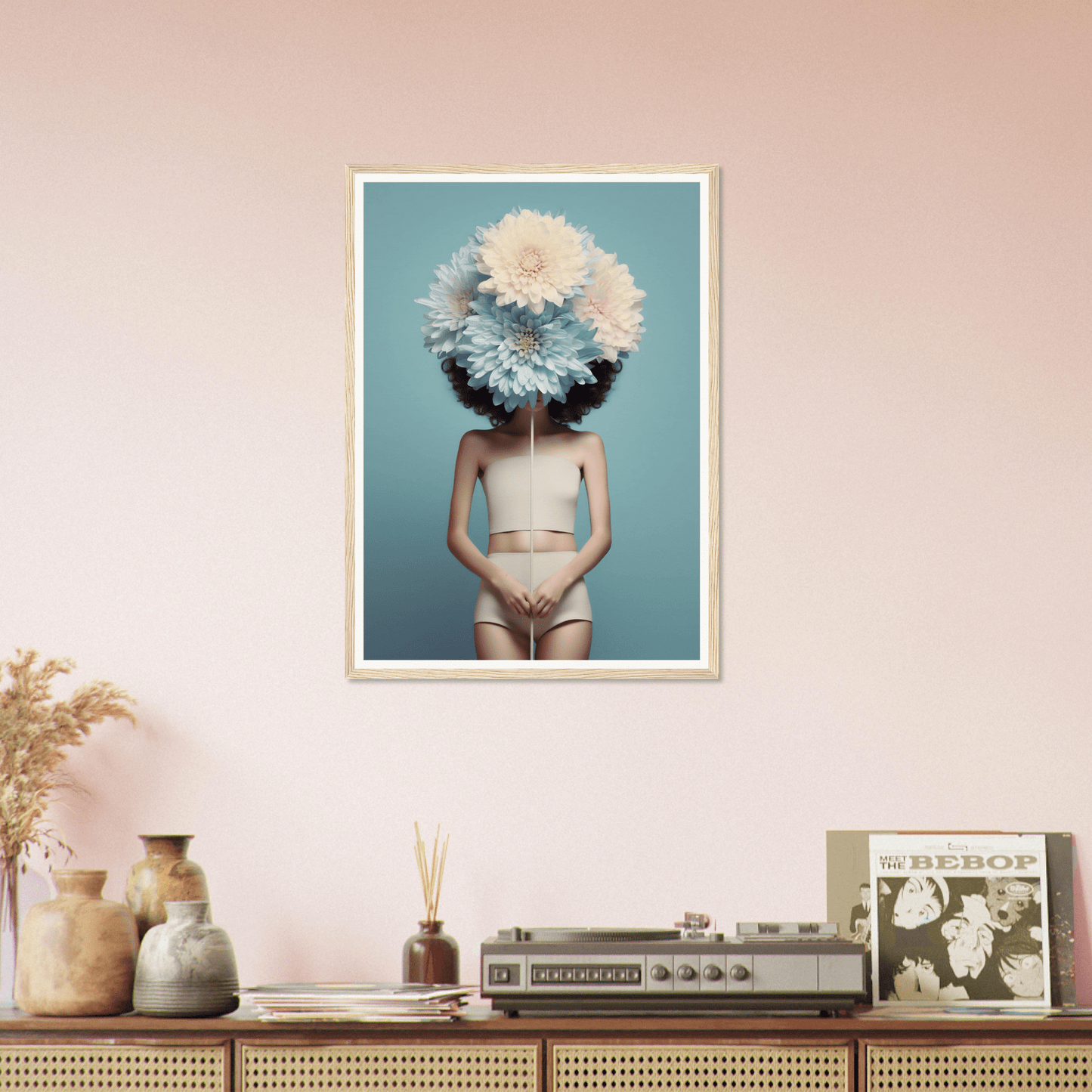 Framed surrealist photograph of a figure with a floral headdress obscuring their face.