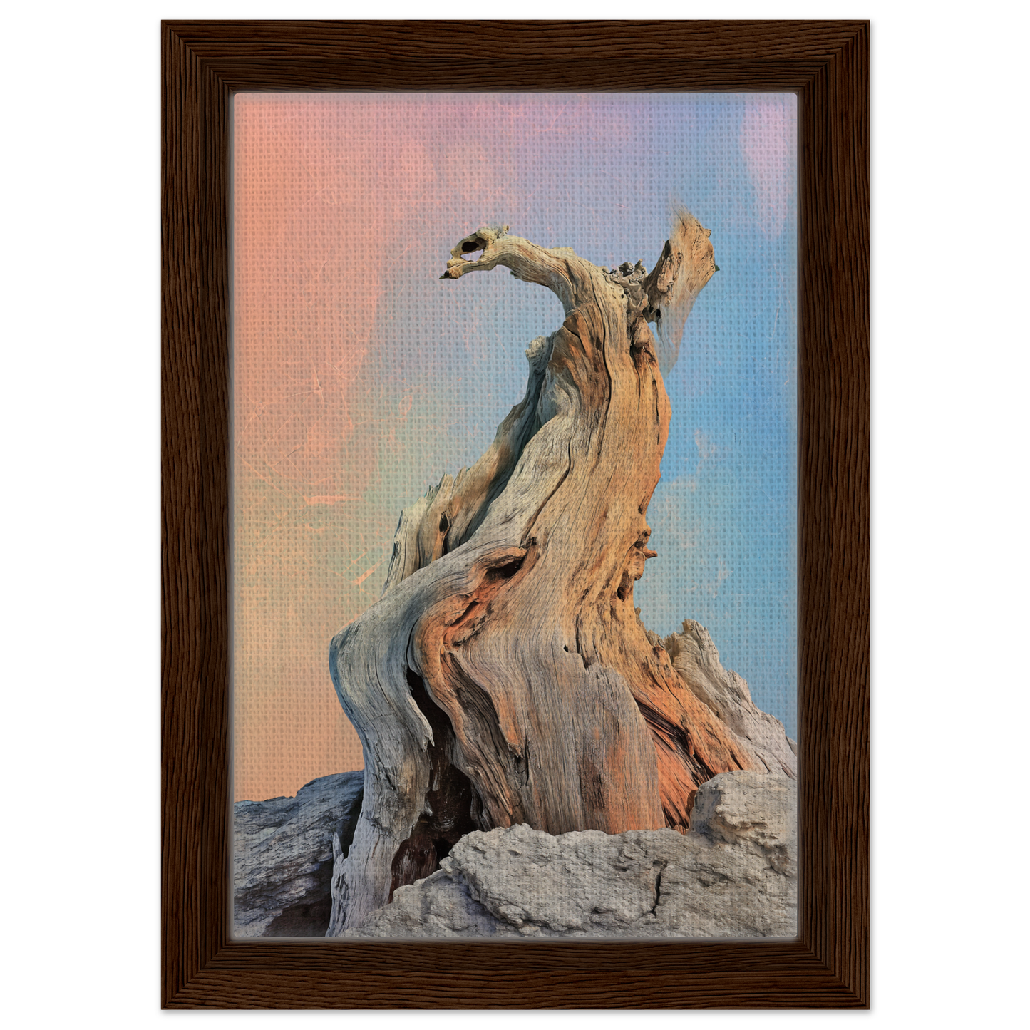 Twisted driftwood against a pastel sky in Mystic Driftwood Dream framed canvas print