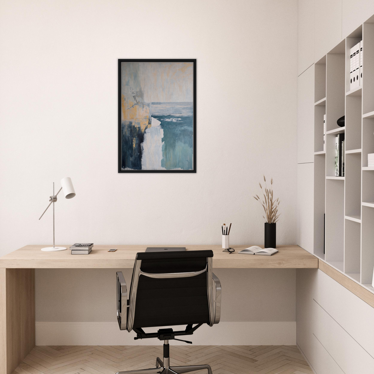 Minimalist home office workspace with wooden desk, black chair, and Blue Framed Canvas