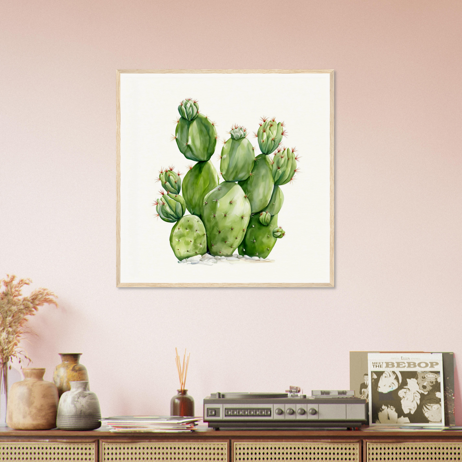 There is a painting of a cactus plant on a wall