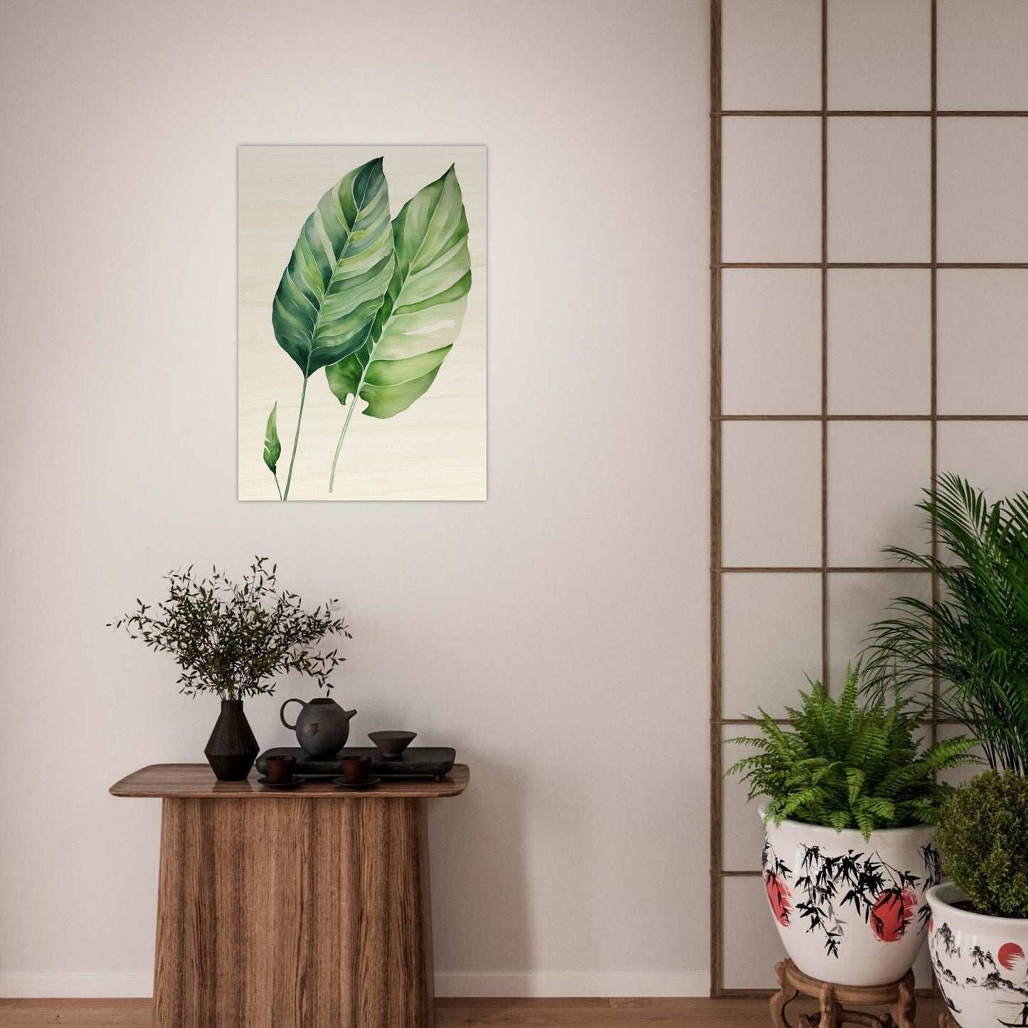 A painting of a green leaf on a wall