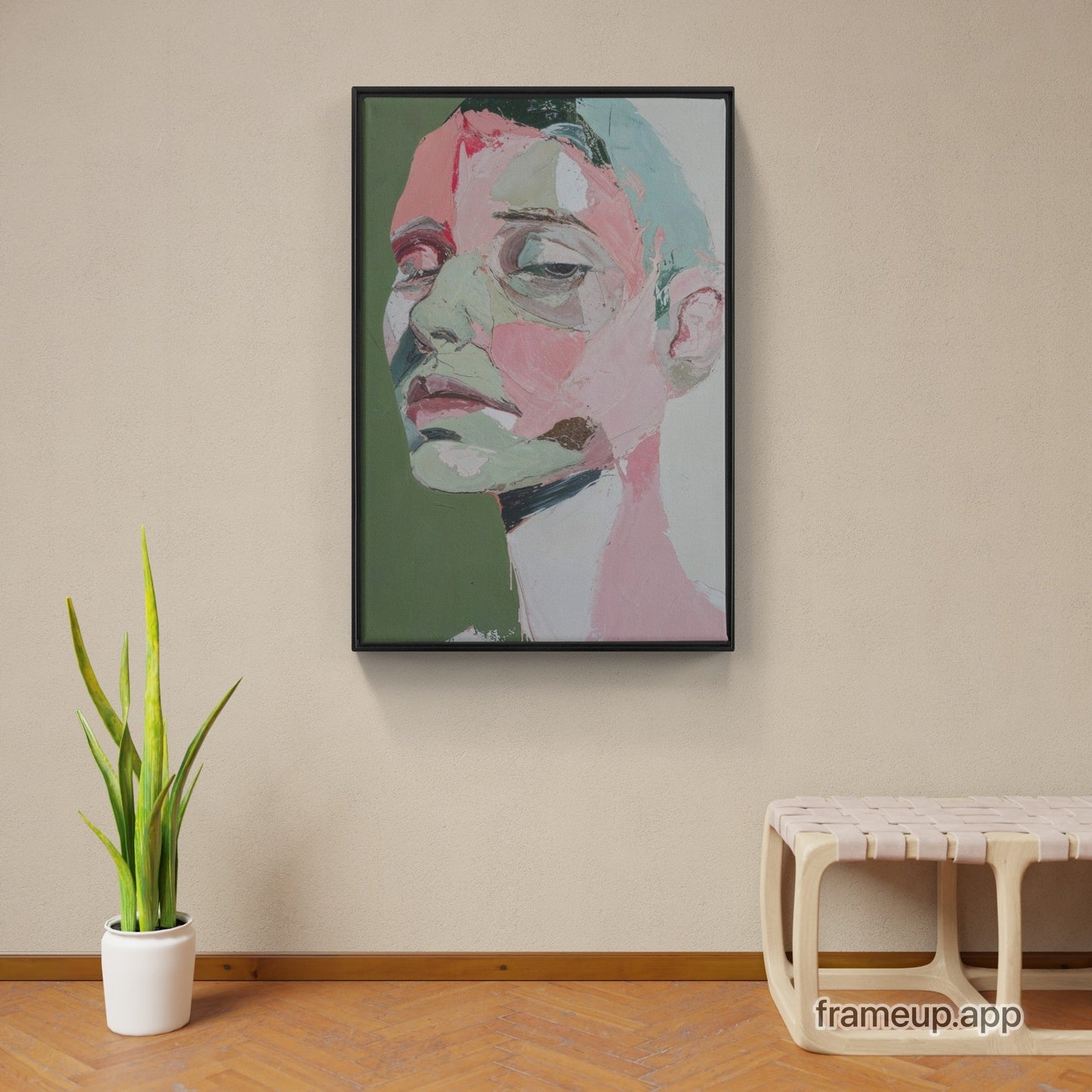 A painting on a wall next to a plant