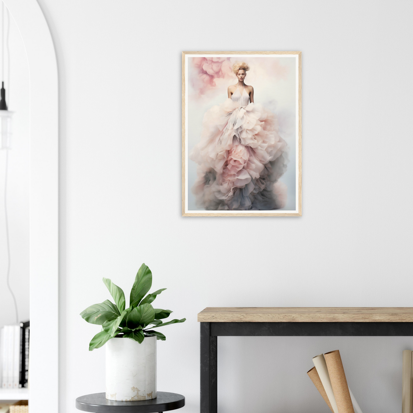 Framed artwork depicting a woman in an ethereal, flowing white gown with pink accents.