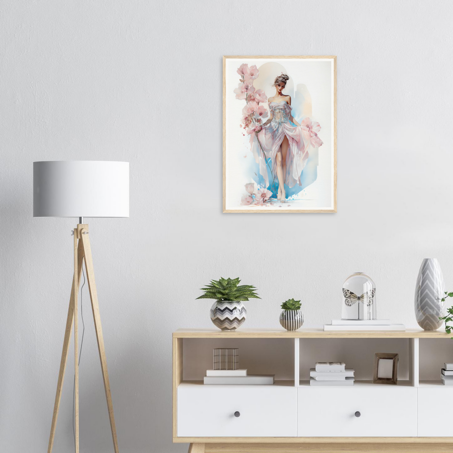 Framed watercolor painting of a graceful figure in a flowing blue dress with pink accents.
