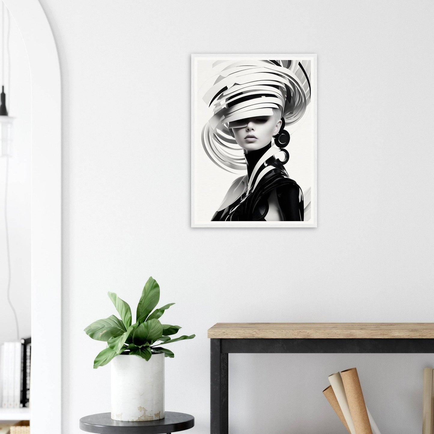 Black and white portrait of a person wearing an elaborate swirling hat or headpiece.