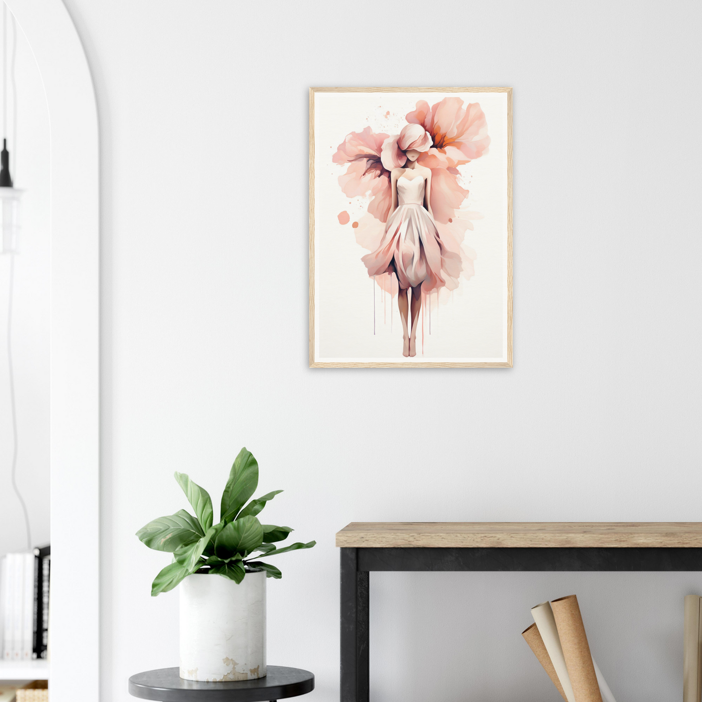 A pink flower on a white wall