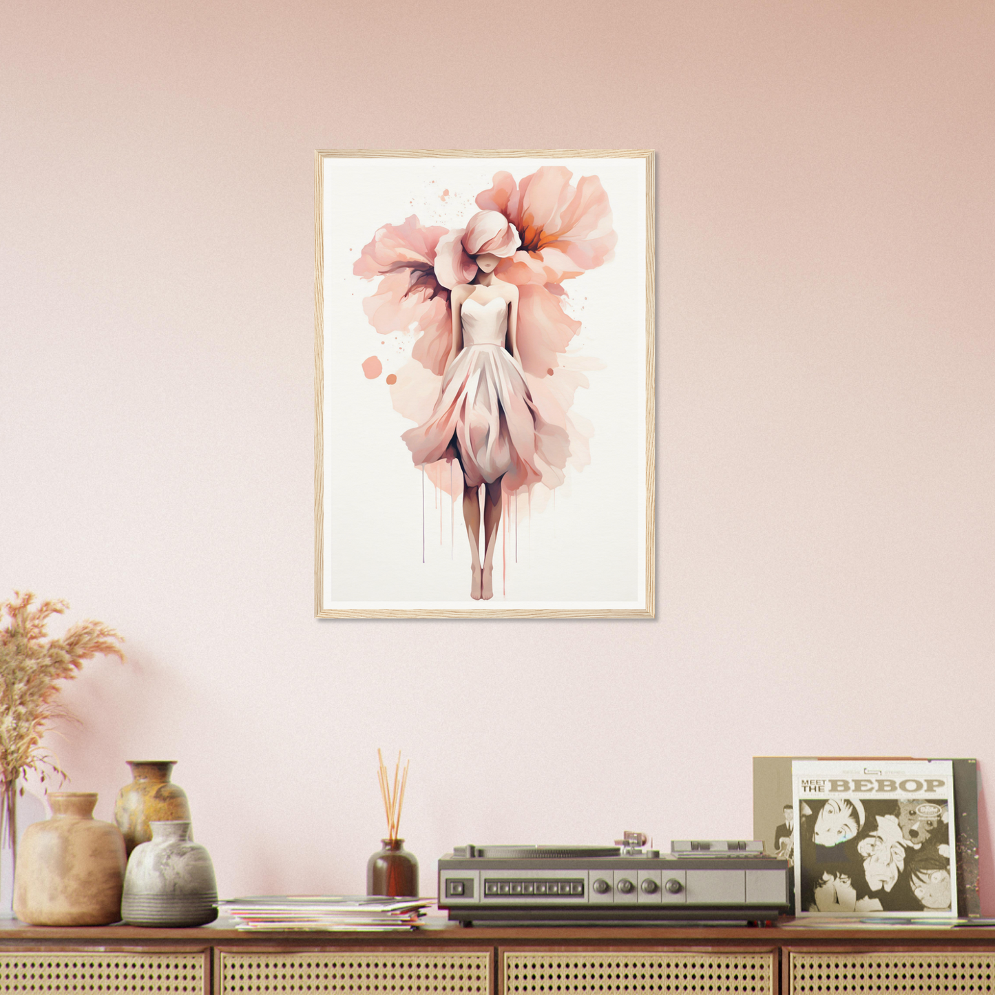 A pink wall with a painting on it
