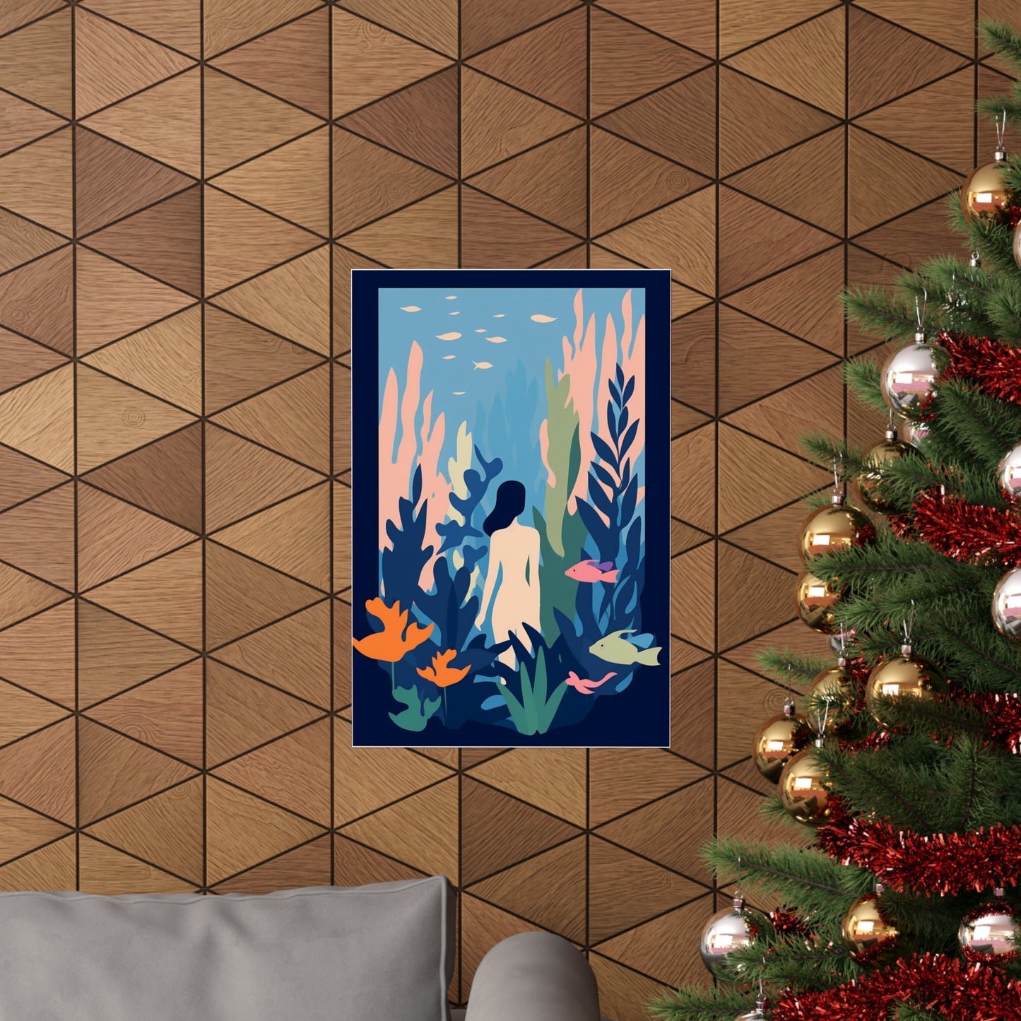 A christmas tree with a picture of a mermaid in the ocean