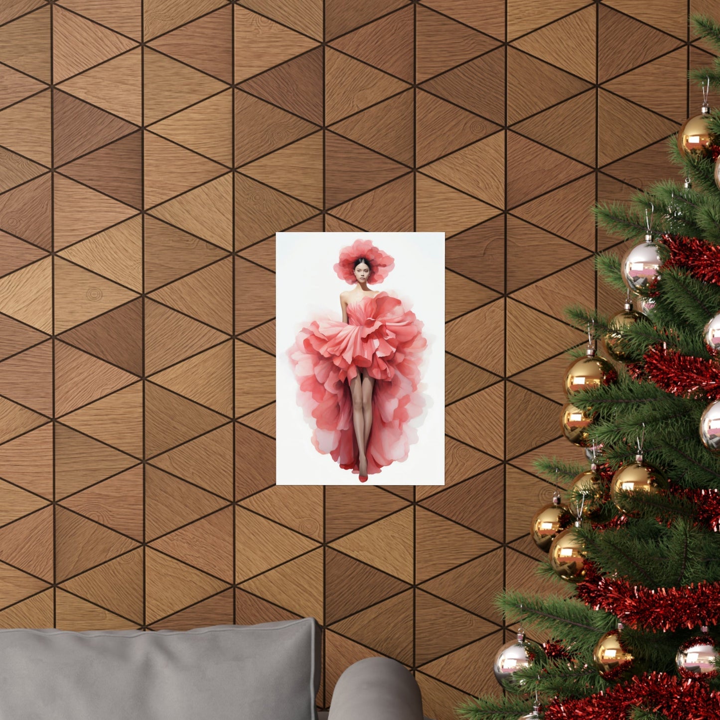 A christmas tree with a pink flower on it