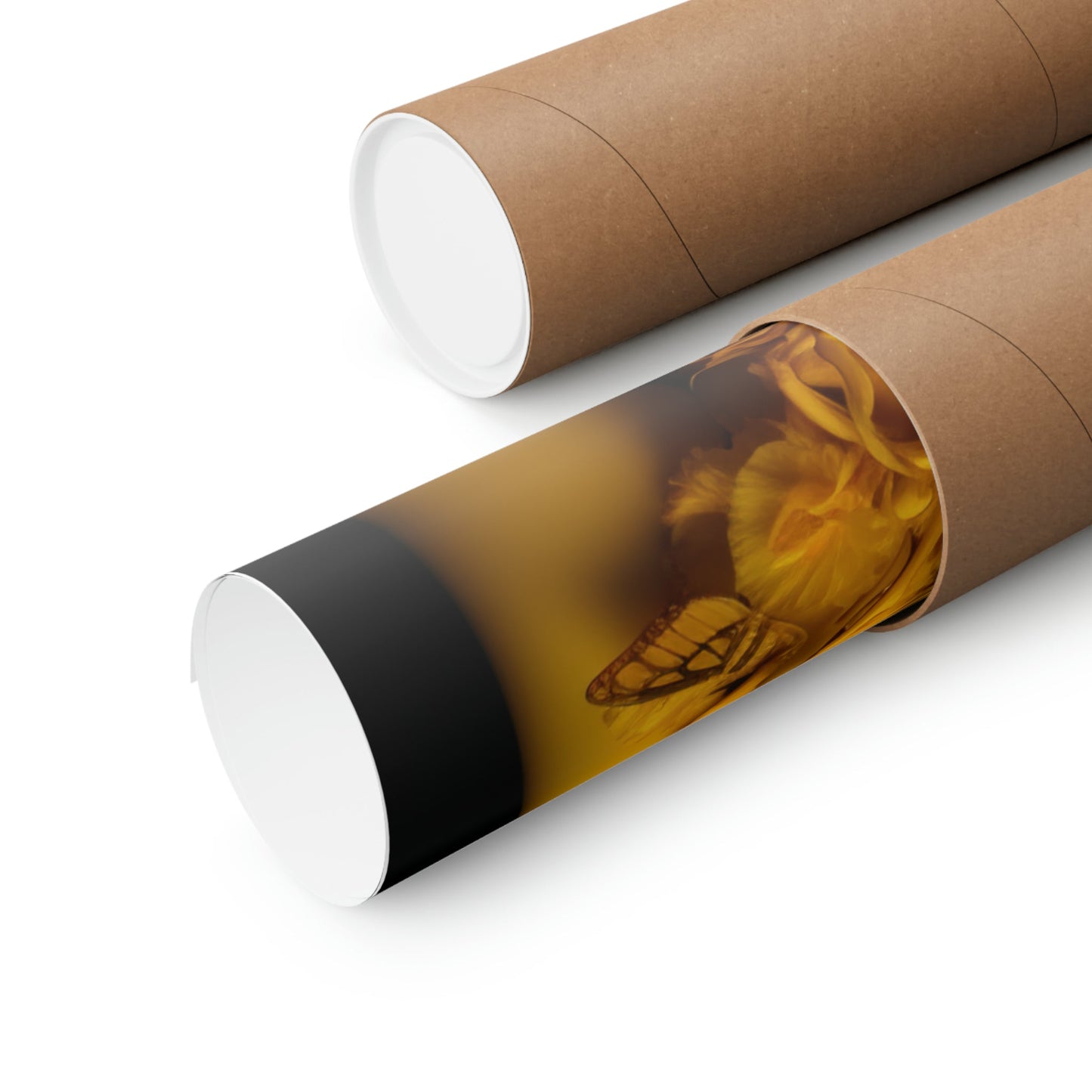Two rolls of brown paper with a flower on them