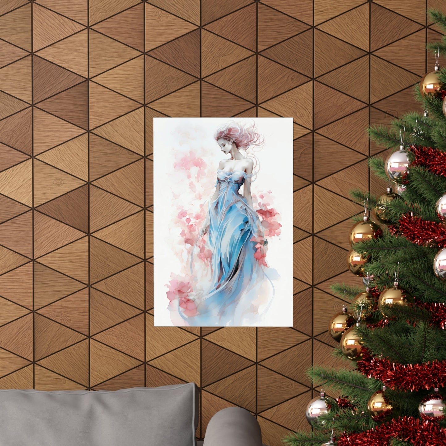 A christmas tree with a painting of a woman in a blue dress
