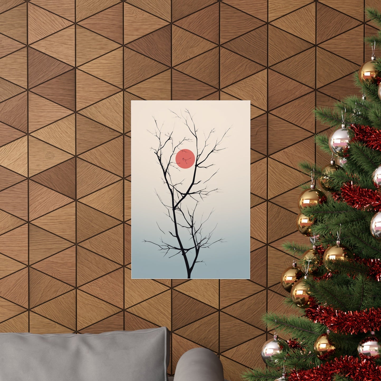 A christmas tree with a red ball hanging on it