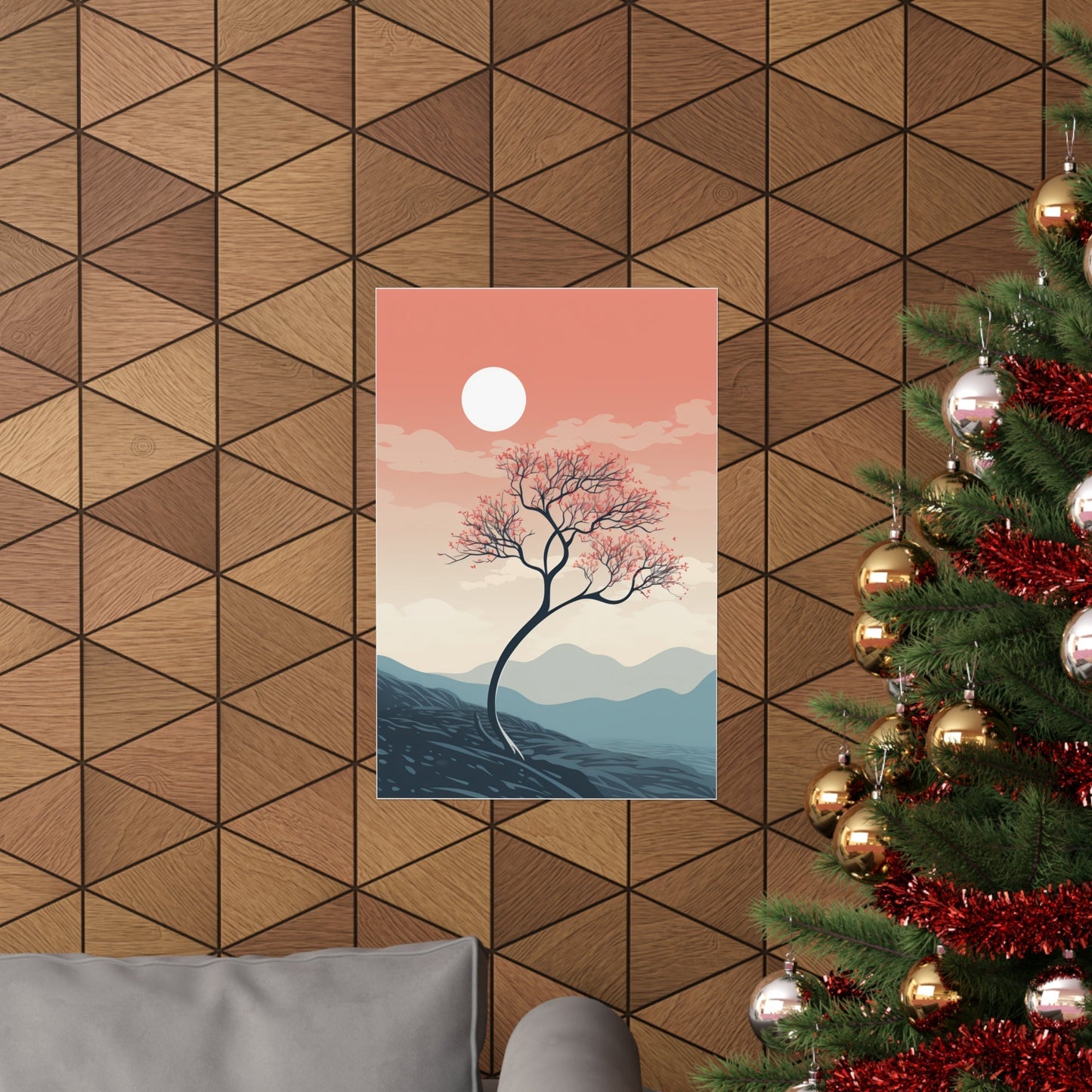 A christmas tree with a pink sky and mountains in the background
