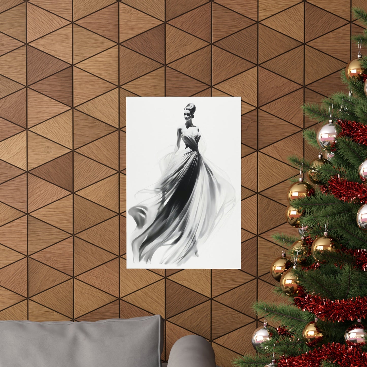 A christmas tree with a white dress hanging on it