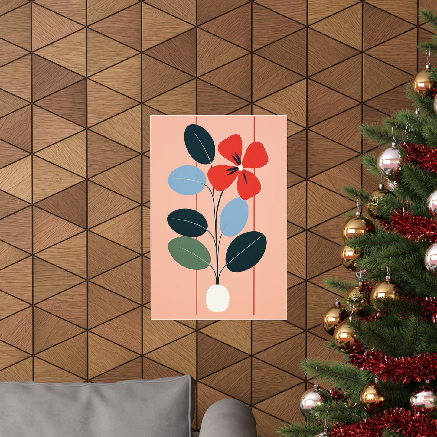 A christmas tree with a red flower on it