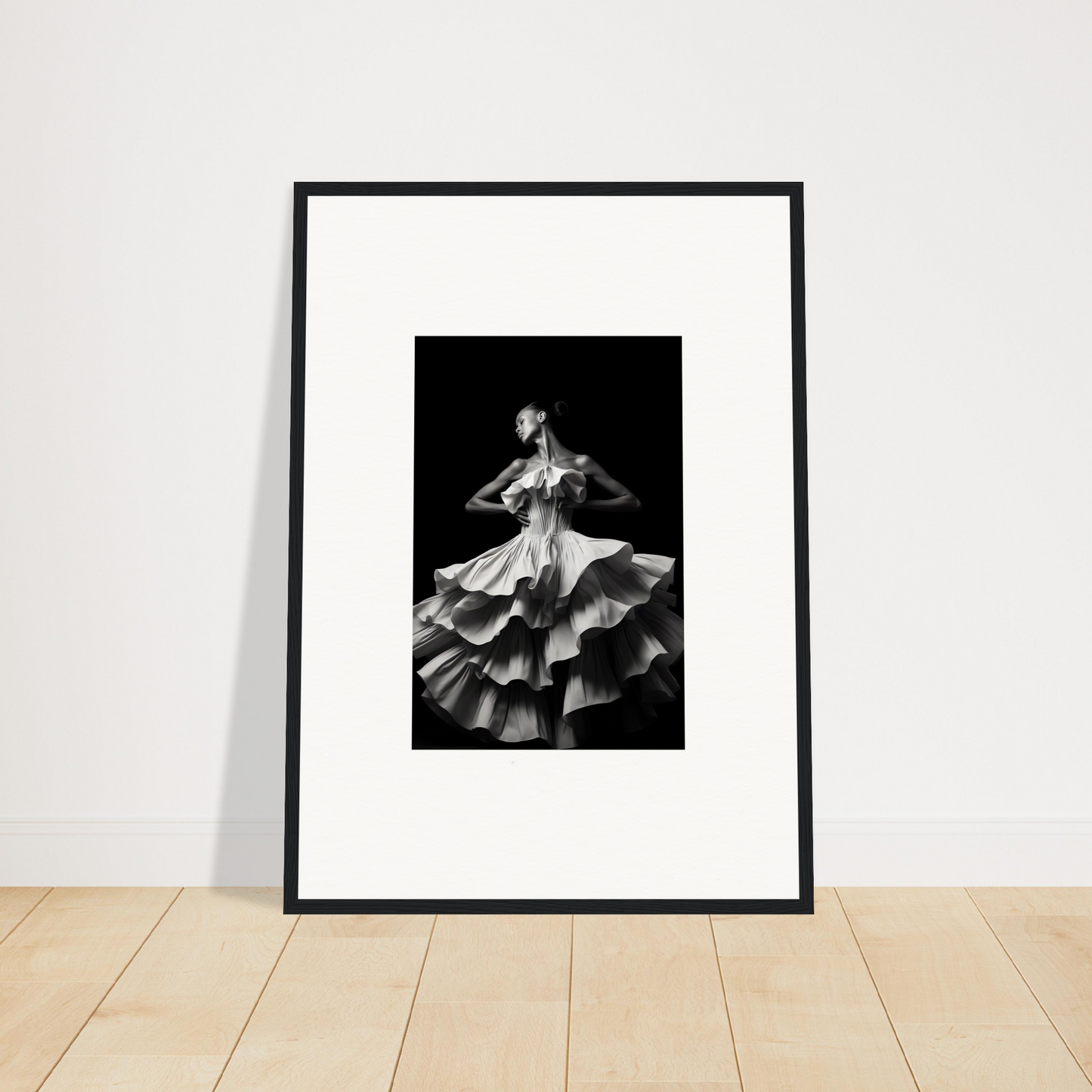 Framed black and white photograph of a dancer in a ruffled dress.