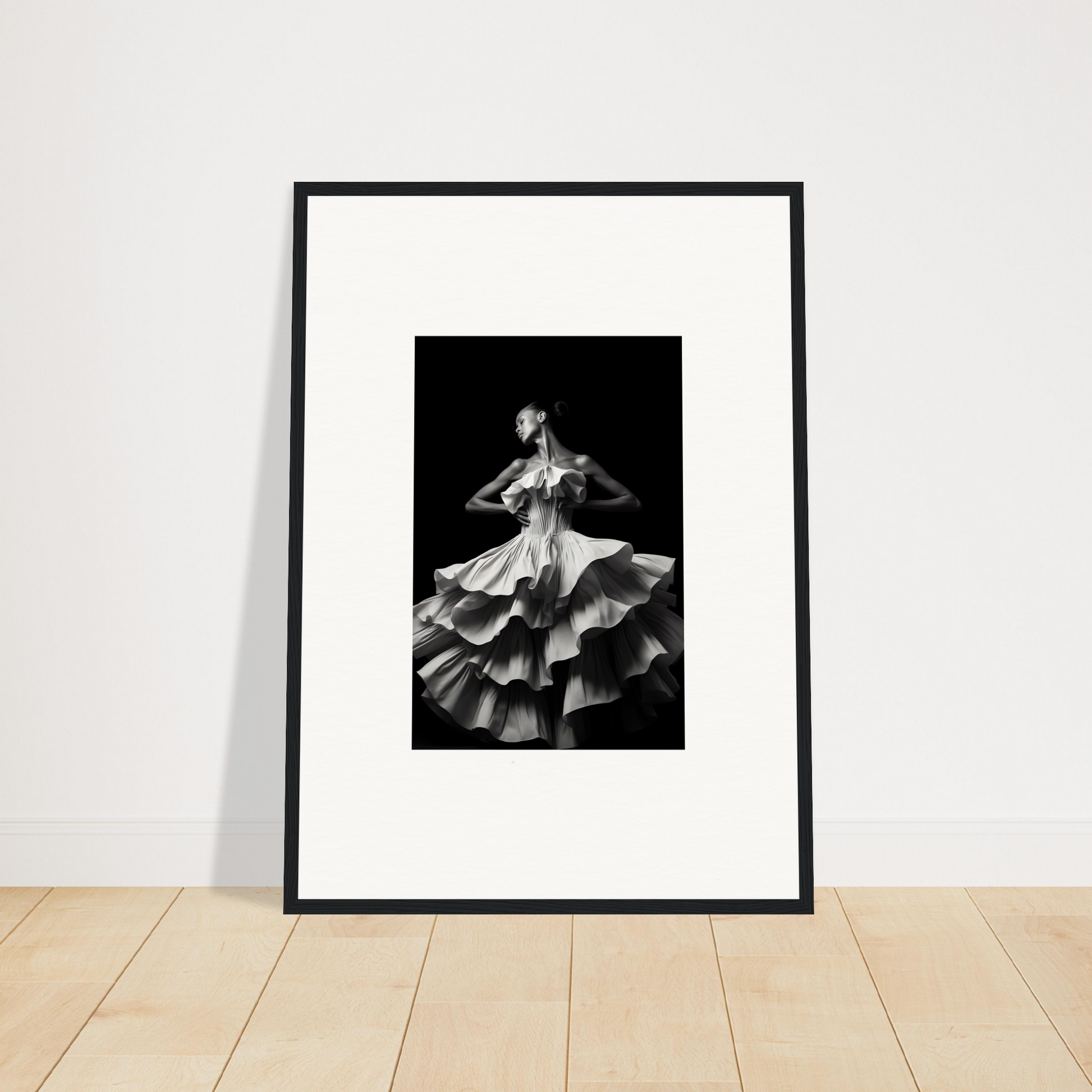 Framed black and white photograph of a dancer in a ruffled dress.