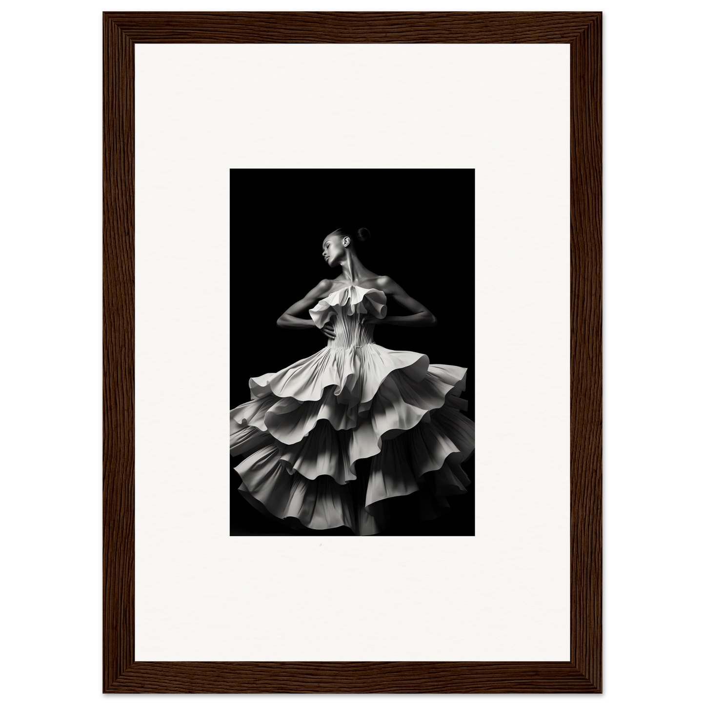 Black and white photograph of a dancer in a ruffled, layered dress.