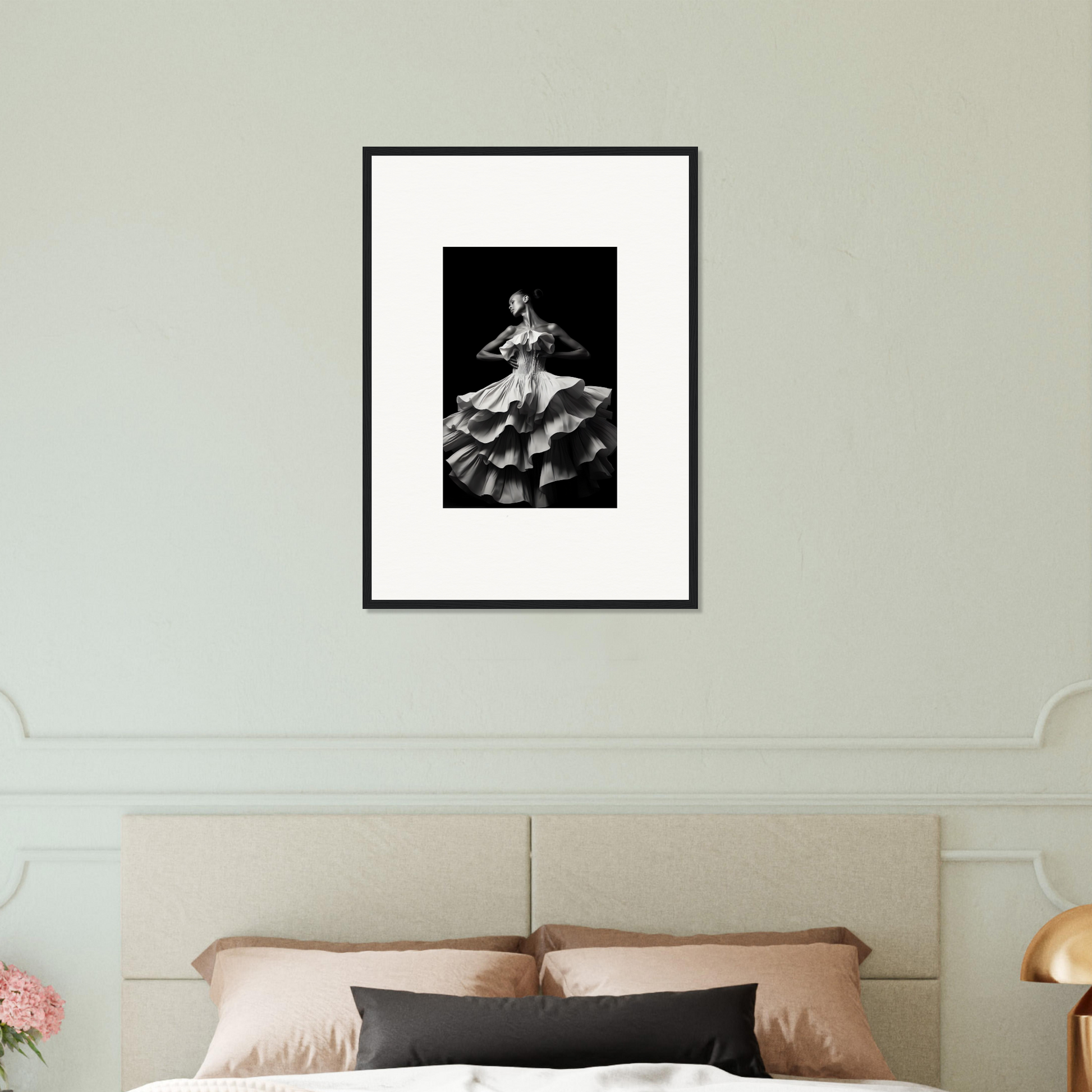 Framed black and white photograph of a dancer in a swirling dress.