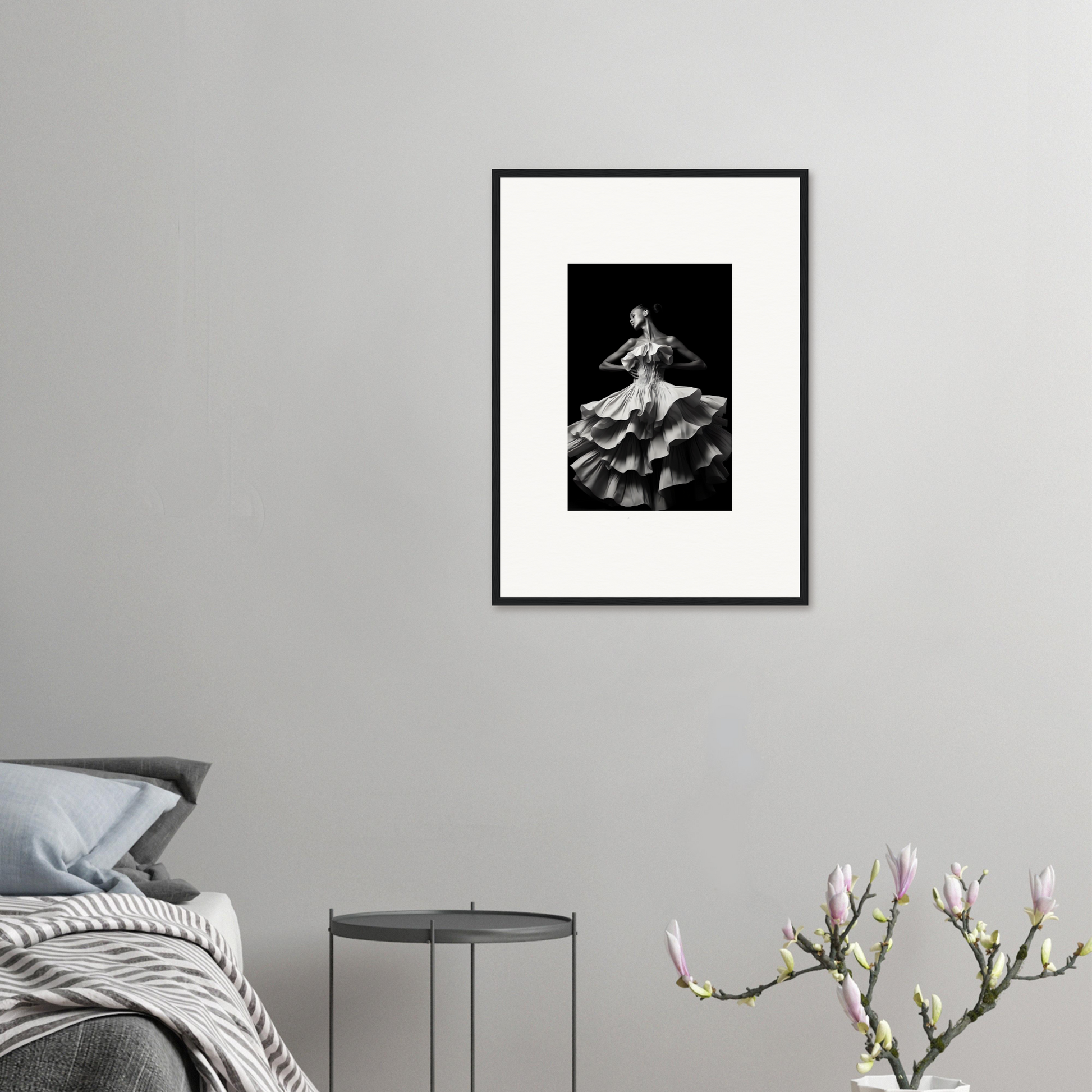 Framed black and white photograph of a dancer in a flowing dress.