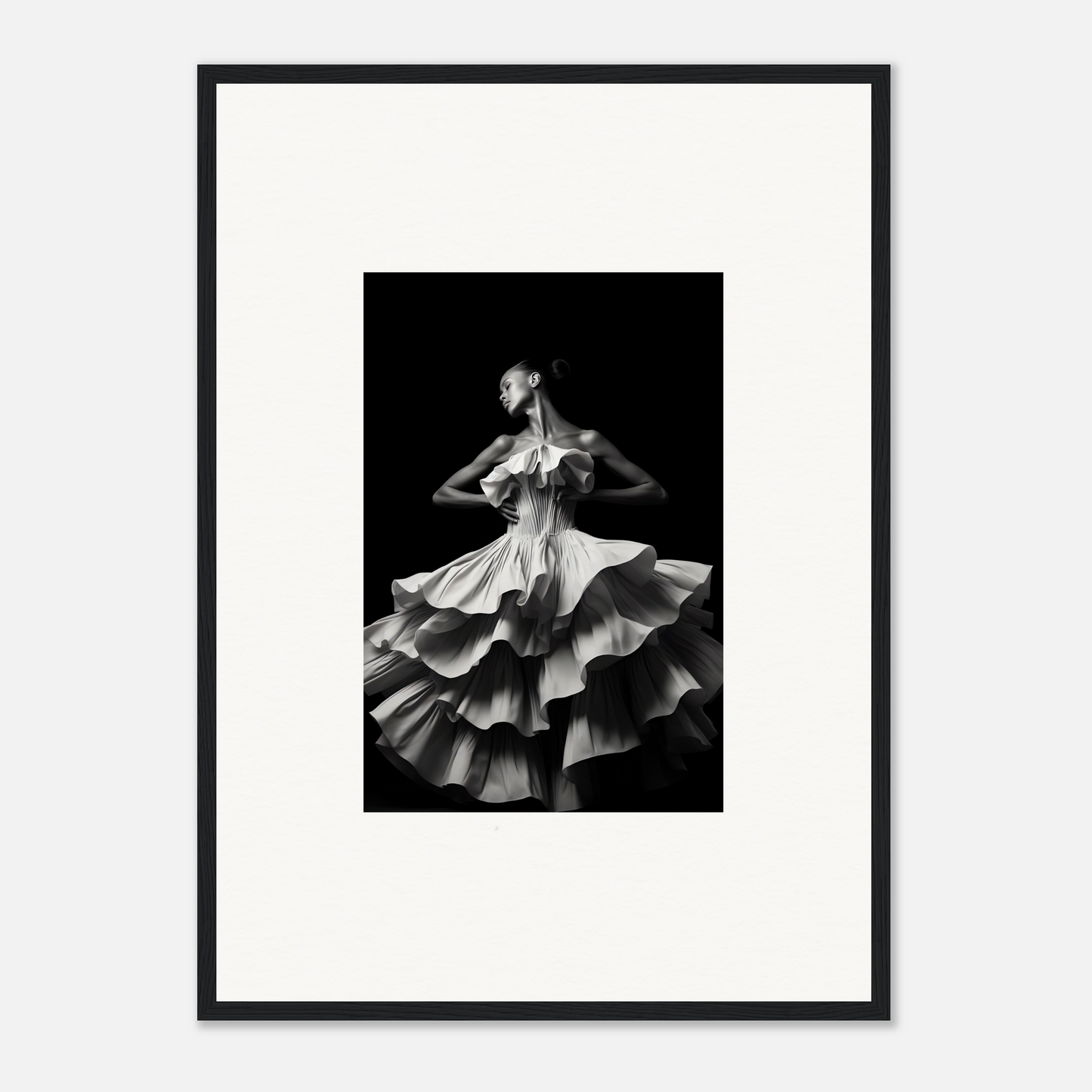 Black and white photograph of a dancer in a flowing, ruffled dress mid-twirl.