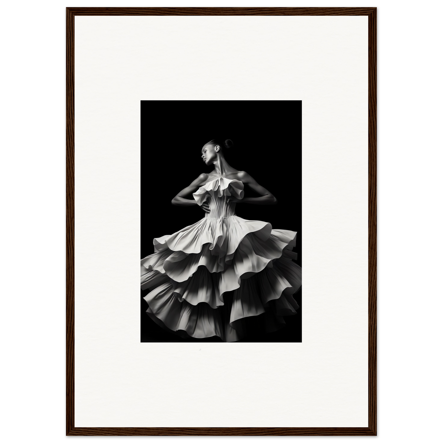 Black and white photograph of a dancer wearing a dramatic ruffled dress.
